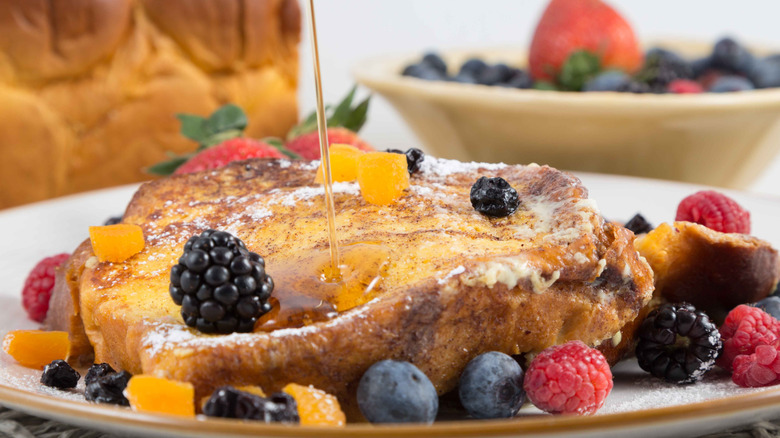 French toast with syrup and berries