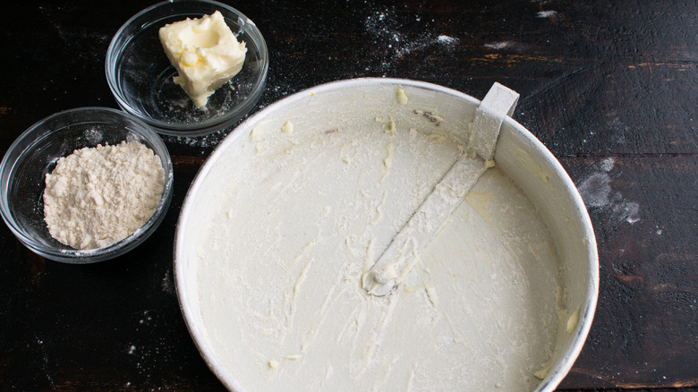 Flour and butter greased pan