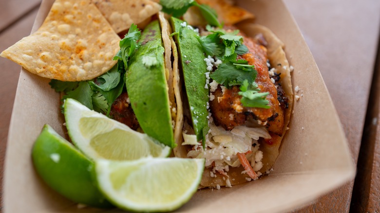 fish tacos with lime and chips