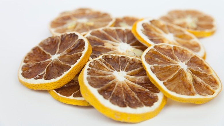 dried lemon slices grey background