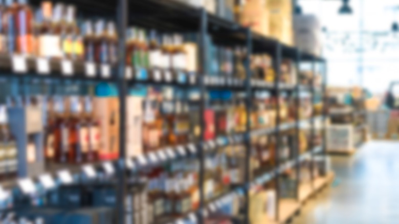 shelves of liquor in soft focus