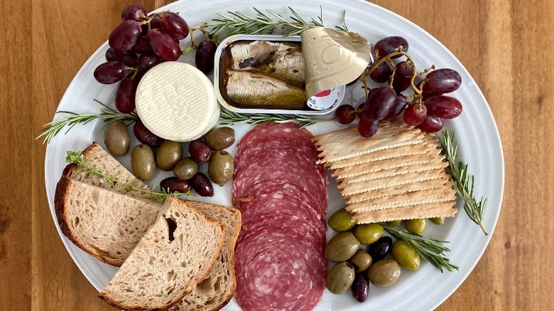 Charcuterie board with sardines