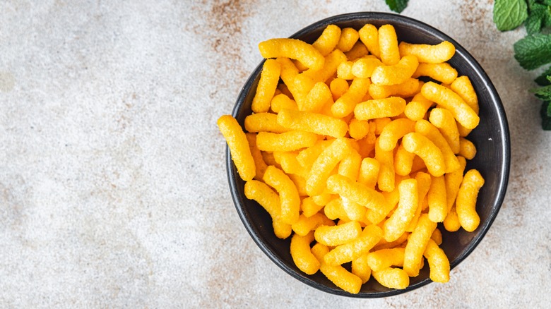 Bowl of cheese puffs