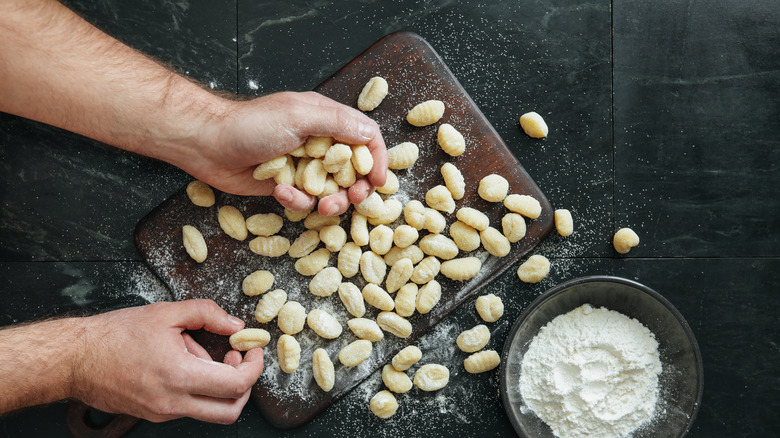 Making homemade gnocchi on countertop
