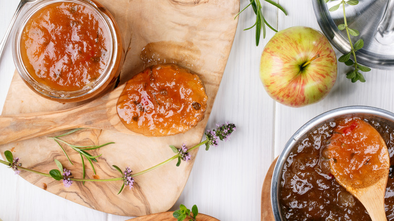 herb apple jelly jar spoon