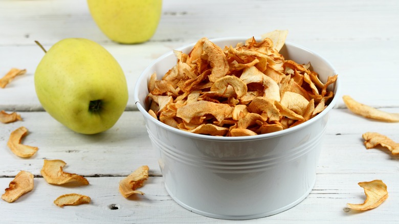 metal bowl of apple chips