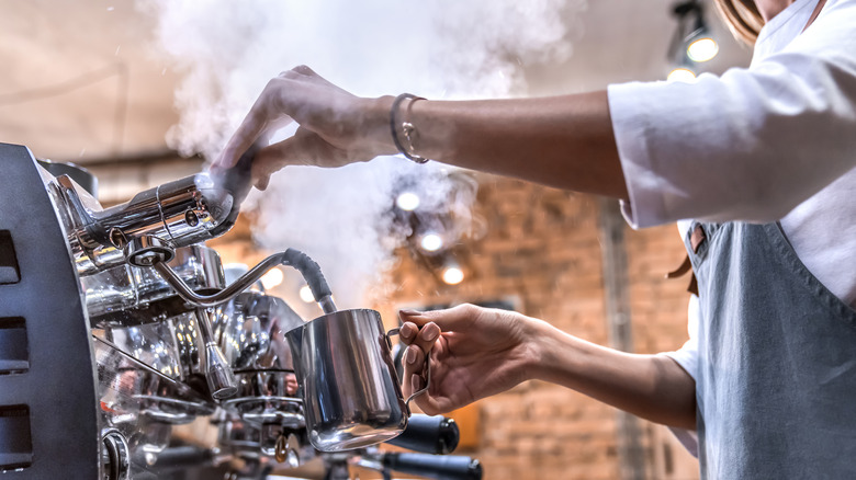 Barista making coffee