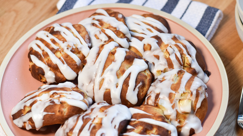 glazed apple fritters on plate