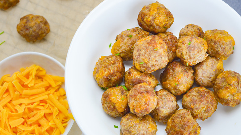 sausage balls and shredded cheese