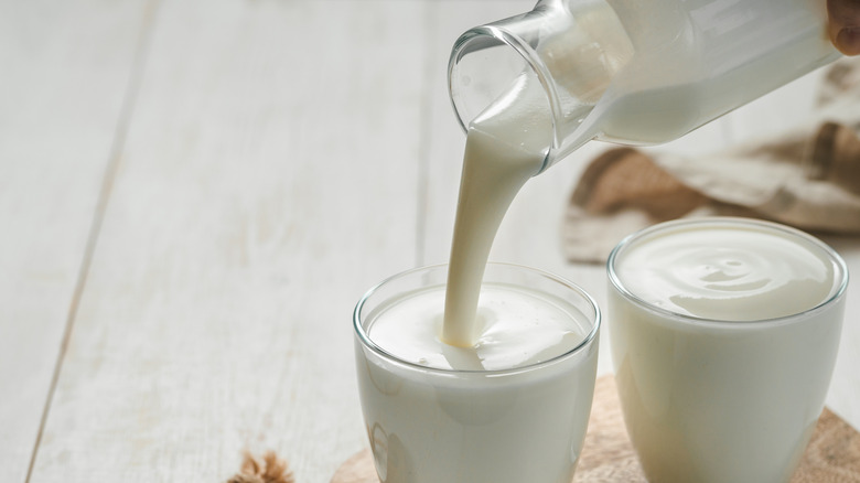 Pouring buttermilk into glass