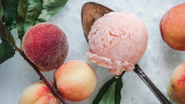 ice cream scoop with peaches