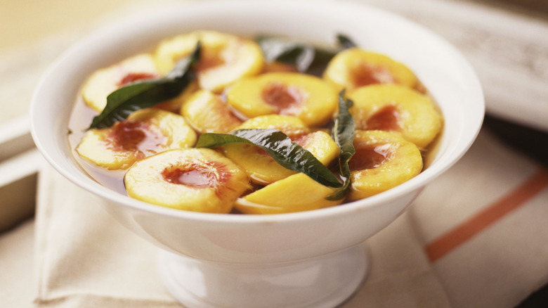 poached peaches in bowl