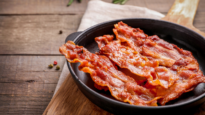 Bacon strips in skillet