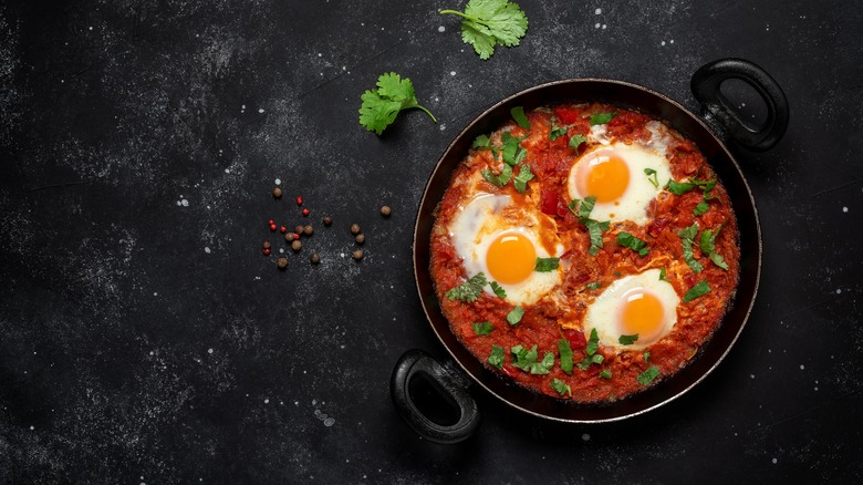 shakshuka topped with eggs