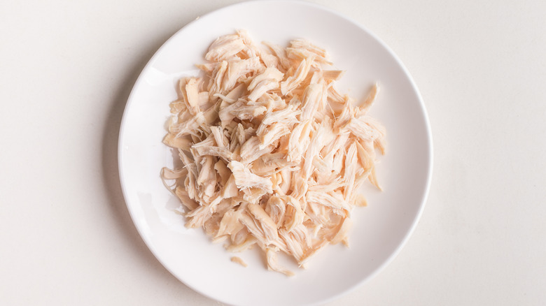 Shredded chicken on plate