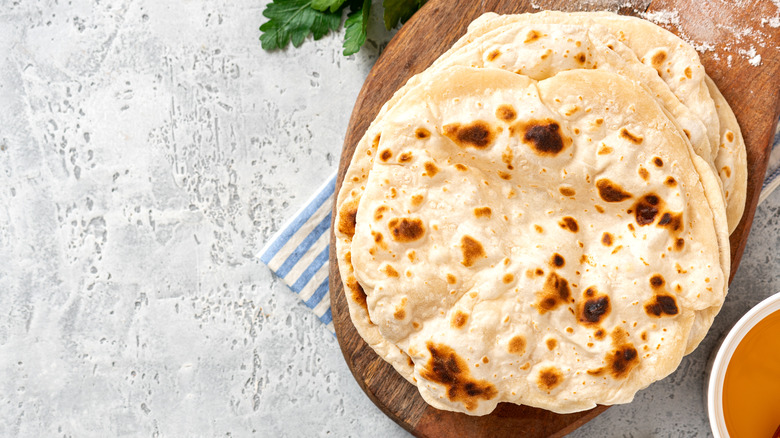 Flatbread on wooden board