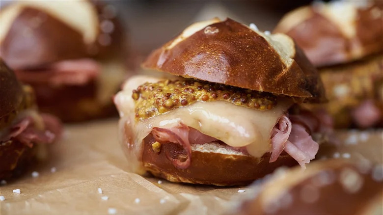 Ham and cheese slider on pretzel bun