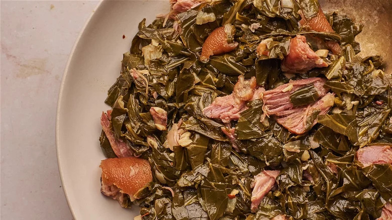 Collard greens with chunks of ham