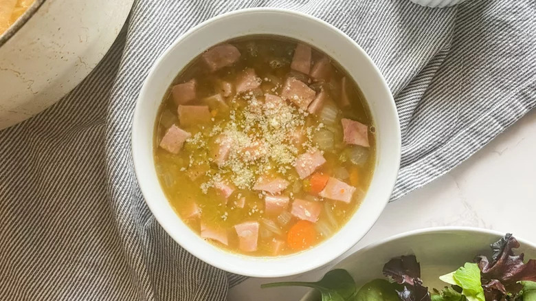 Bowl of split pea soup with ham