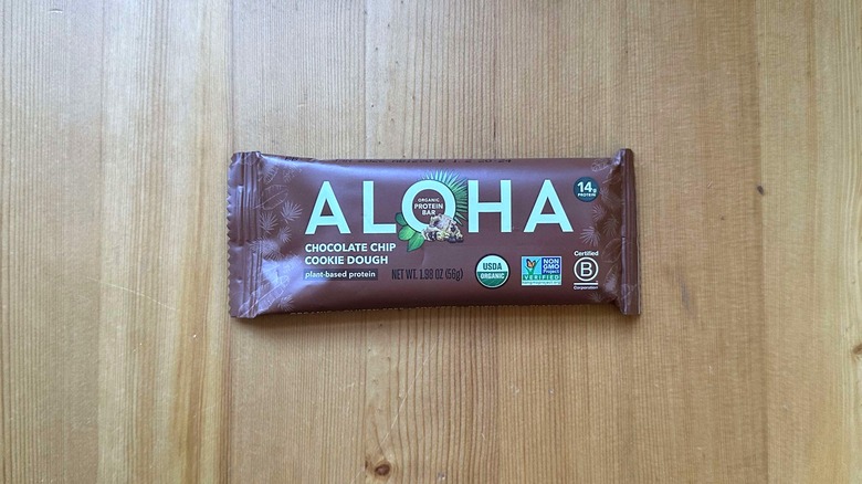 Aloha protein bar on wooden table