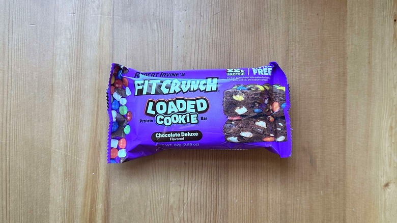 Fit Crunch protein bar on wooden table