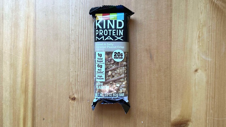 Kind protein bar on wooden table