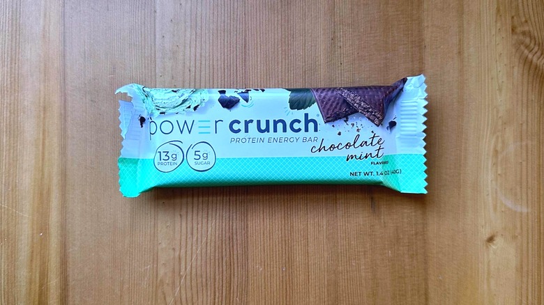 Power Crunch protein bar on wooden table