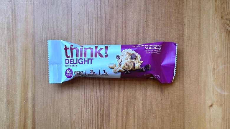 Think! protein bar on wooden table