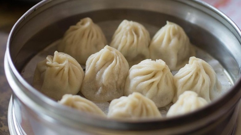 Soft soup dumplings in steamer