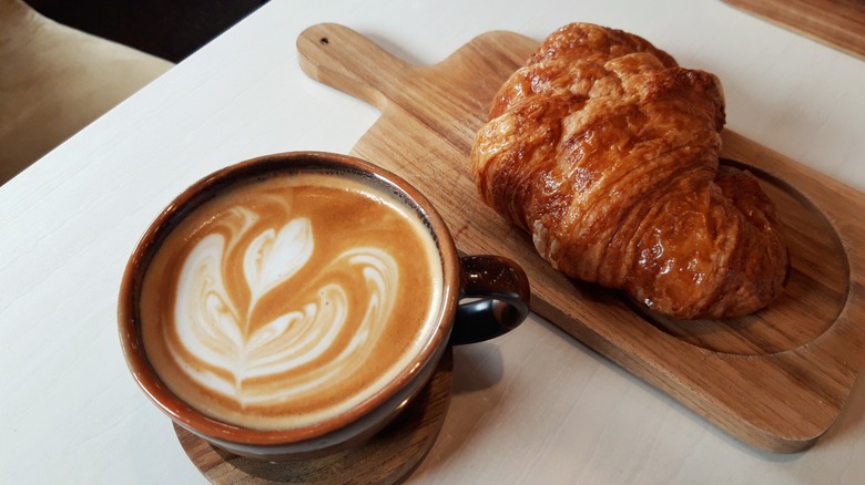 latte art with croissant