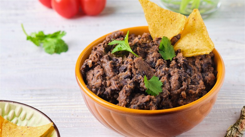 Bowl of refried black beans