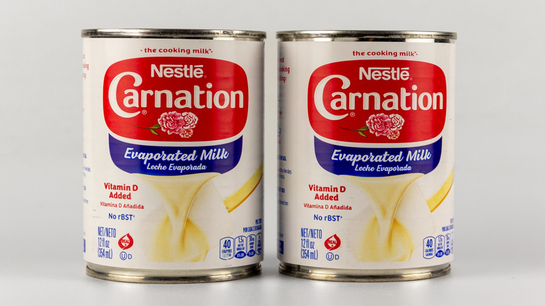 Evaporated milk cans next to each other