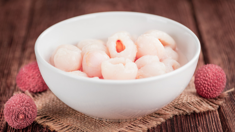 Preserved lychees in white bowl