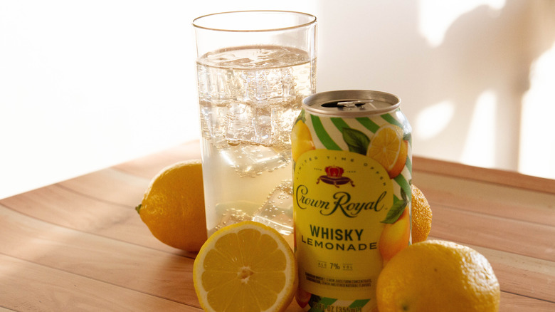 Glass and can of Crown Royal Whisky Lemonade