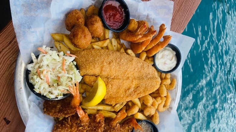 Joe's Crab Shack seafood platter with hush puppies