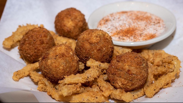 Rockfish Seafood Grill hush puppies with remoulade sauce and clams