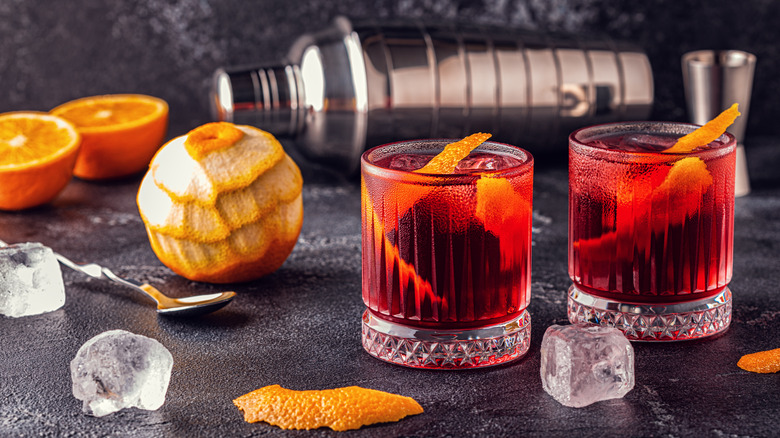 negroni cocktails and peeled orange