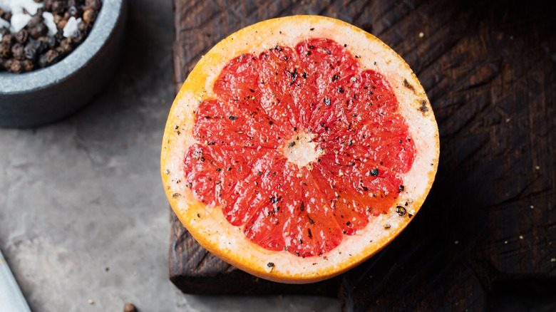 Caramelized grapefruit on wooden board 