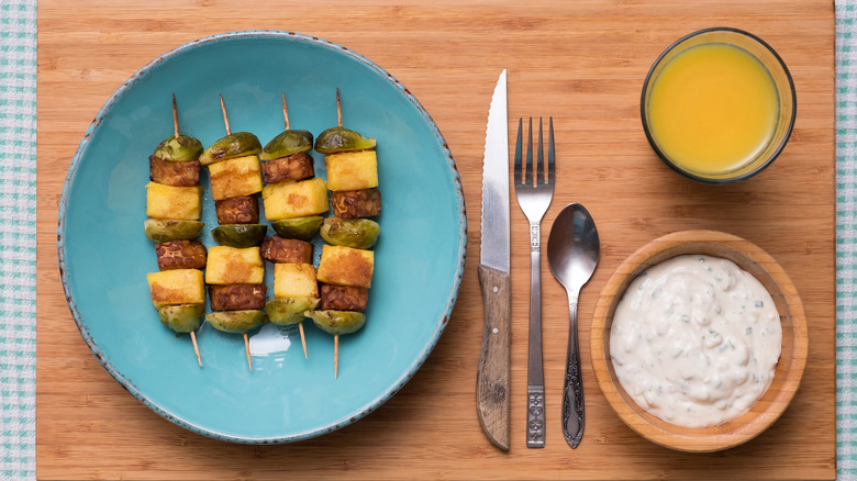 tempeh, polenta, and brussels sprouts skewers