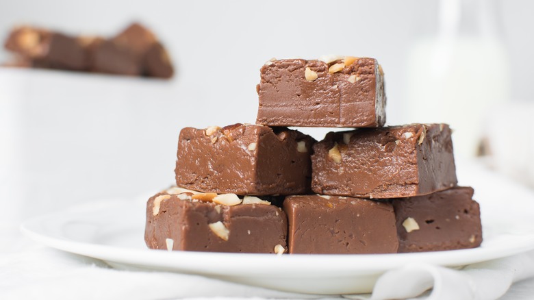 Stacked blocks of fudge on plate