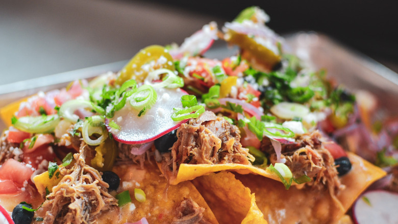 nachos topped with pimento cheese 