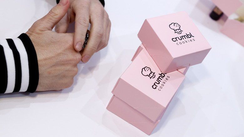 Pink Crumbl boxes