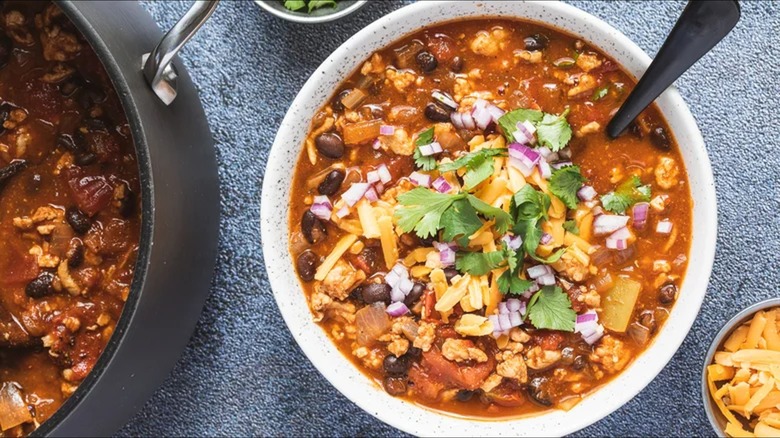 pot and bowl of turkey chili