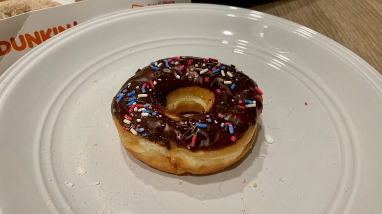 Chocolate Dunkin' Donut on plate