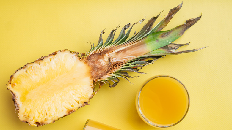 pineapple with glass of juice