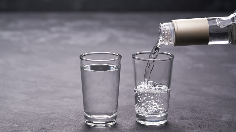 shot glasses being filled