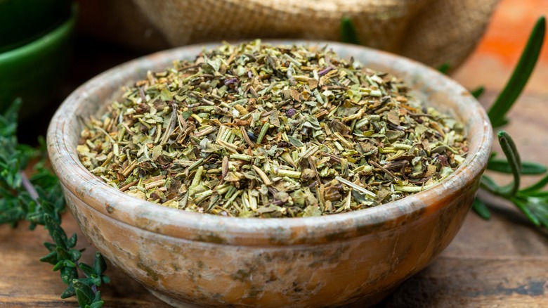 Mixed herbs in marble bowl 