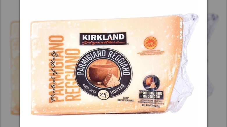 Block of Kirkland Signature Italian Parmesan Parmigiano Reggiano with white background