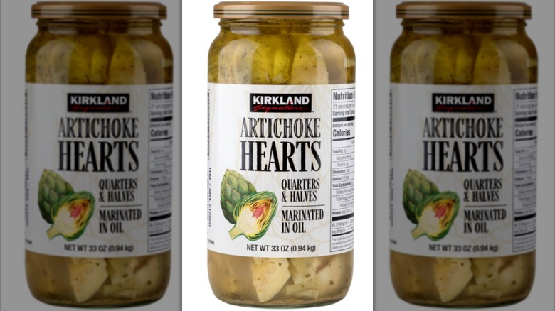 Kirkland artichoke hearts jars with white background