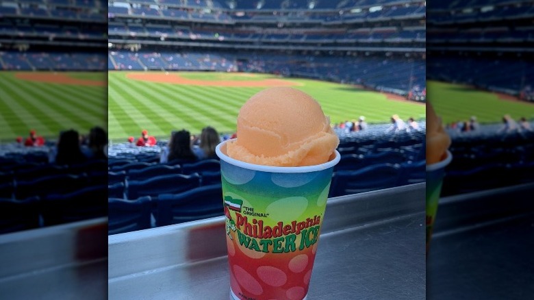 Person holding water ice